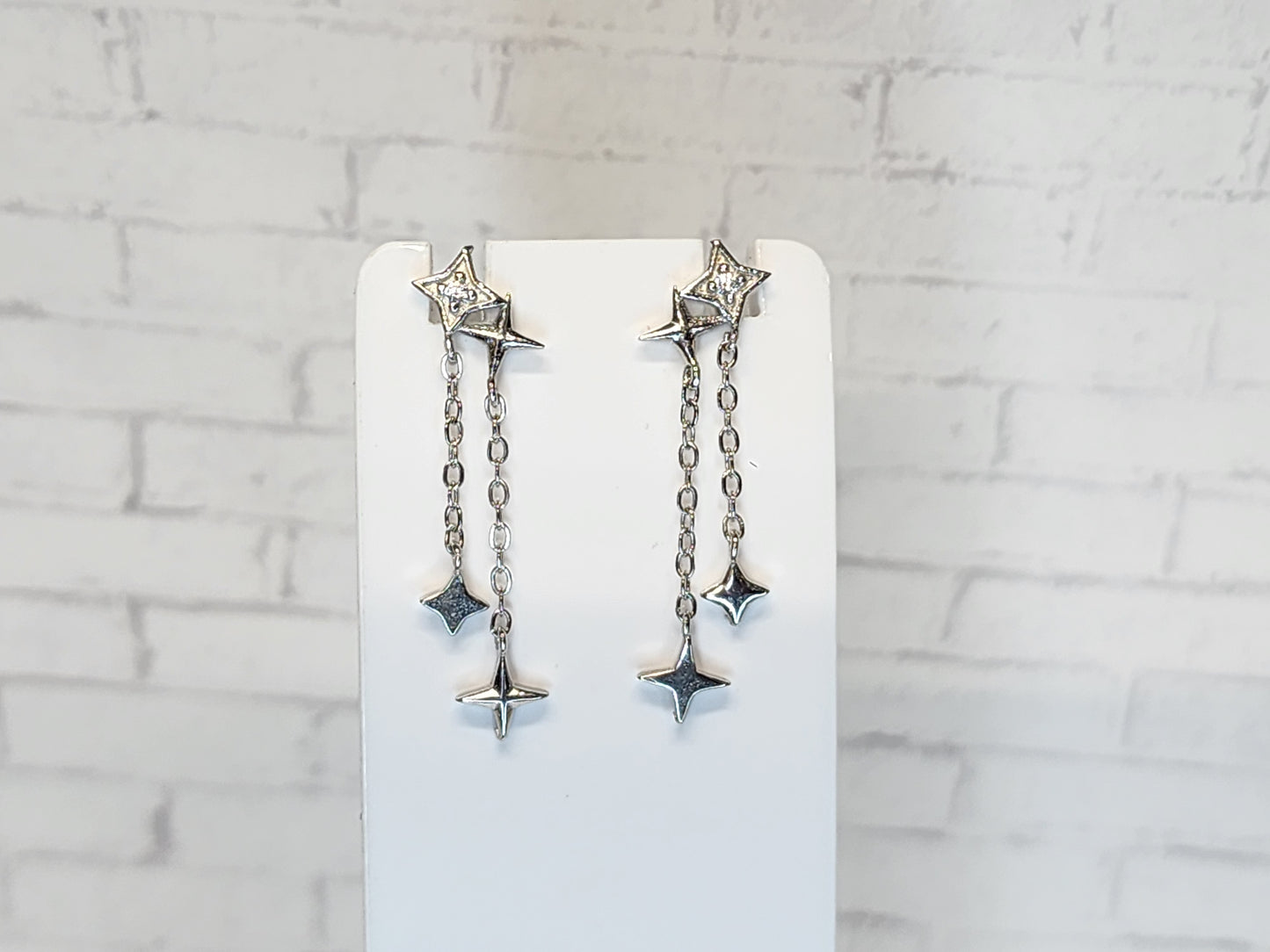 Sterling Silver Earrings E03 White Dangle Stars