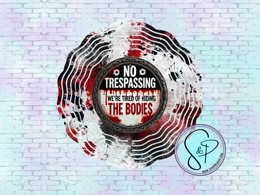 No Trespassking We're tired of hiding the Bodies - 8" Wind Spinner