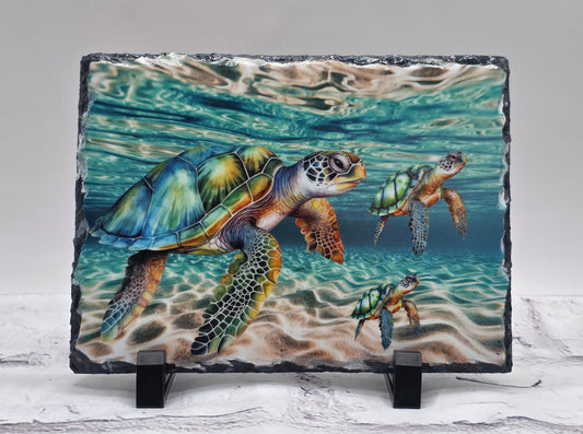 Decorative slate with a turtle design on a white surface